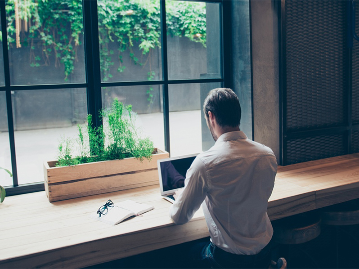 man working with a laptop